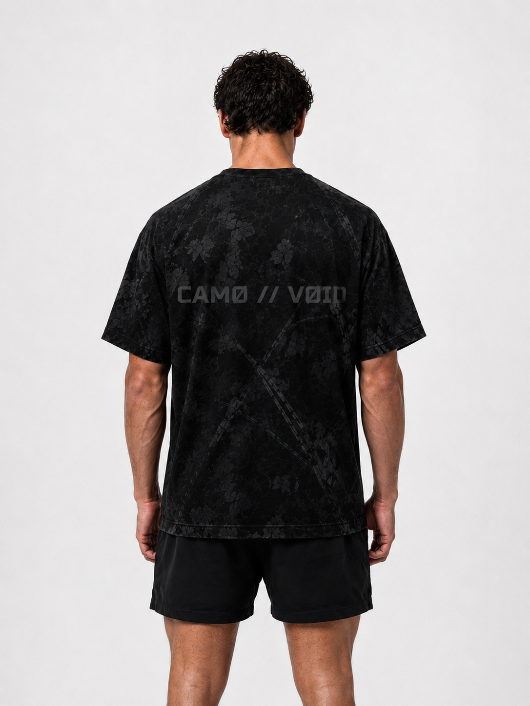 VOID TEE 001 — BLACK WOODLAND CAMO